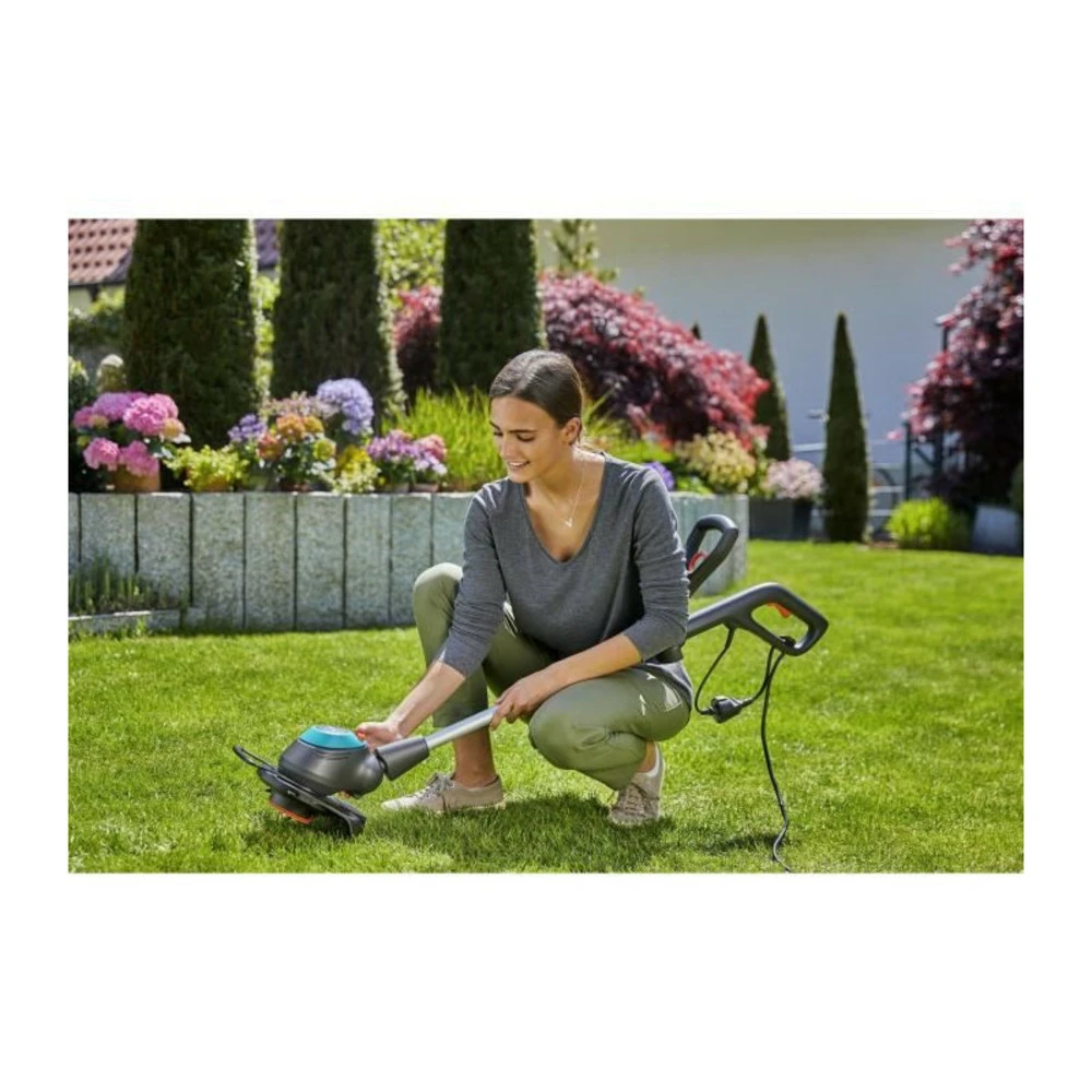 Gardena Coupe-bordures Easycut 450/25 – 450w – ø25cm – Fil Rotorcut – Manche Télescopique Inclinable – Etrier Protec 5 Gardena Coupe-bordures Easycut 450/25 – 450w – ø25cm – Fil Rotorcut – Manche Télescopique Inclinable – Etrier Protec – Image 5